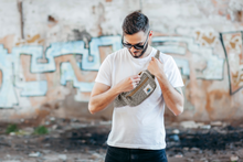 Load image into Gallery viewer, male model with black fanny pack